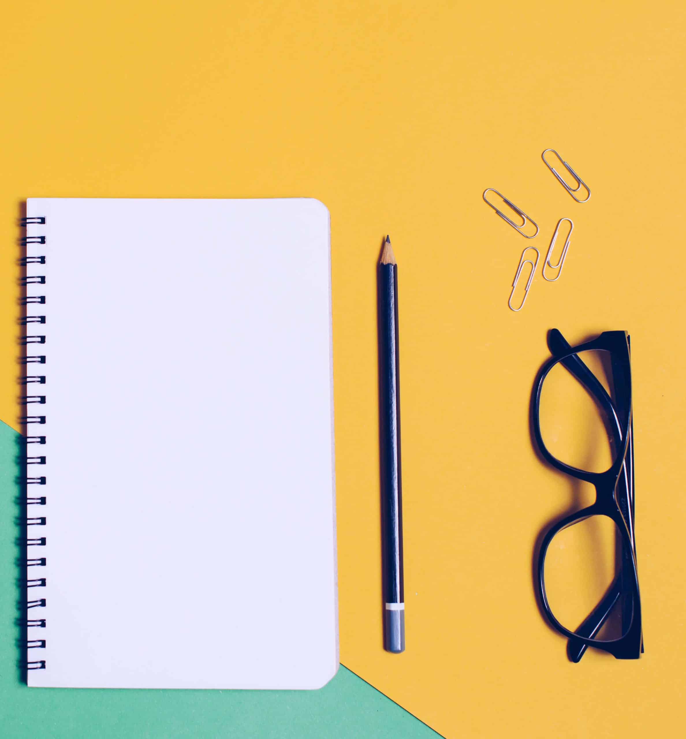 Blank_Notebook_And_Writing_Supplies-scaled