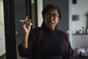 Businesswoman presenting ideas during meeting
