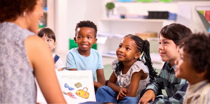 Group of children listening to a children's book
