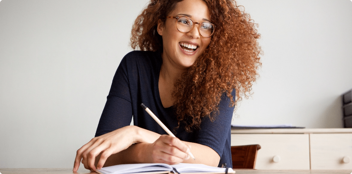 Develop the Idea, Woman with a writing utensil and paper